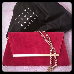 Red suede handbag